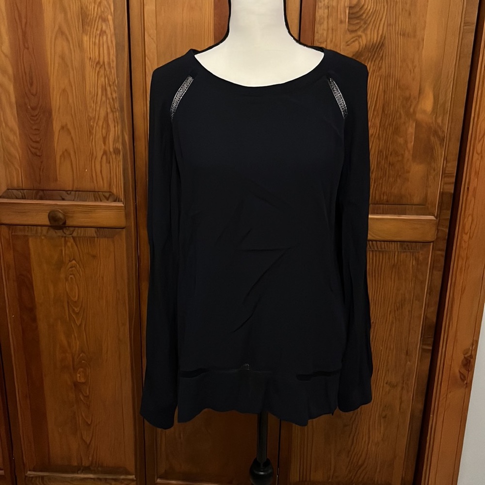 Loft navy blouse with peakaboo details near shoulders and at bottom